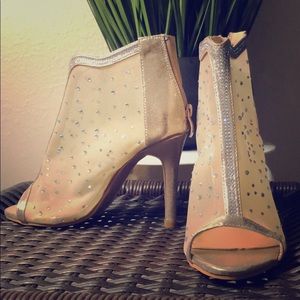 Gold caged mesh stilettos with rhinestones.
